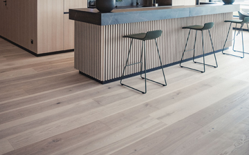 Beautiful ash plank flooring with a brown core